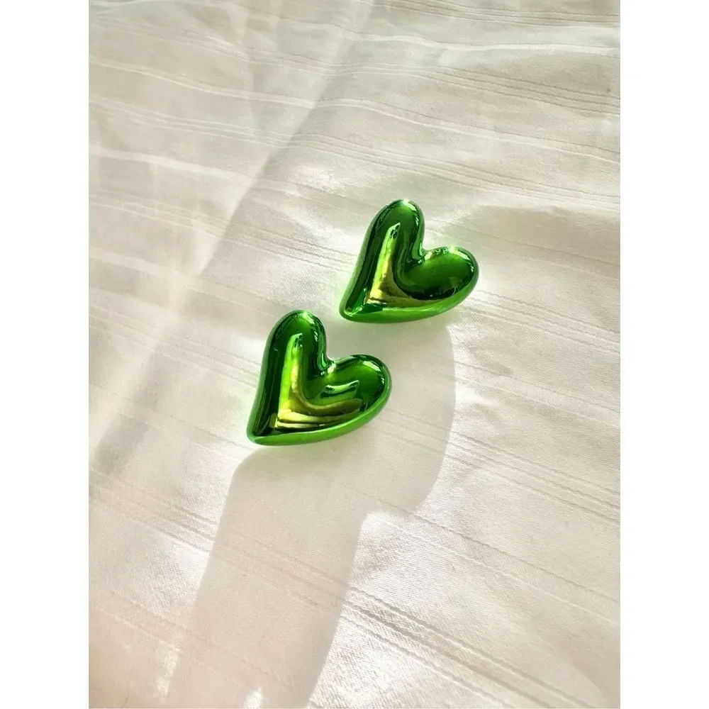 Chrome green heart stud earrings